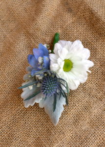 Pastel blue and white buttonhole
